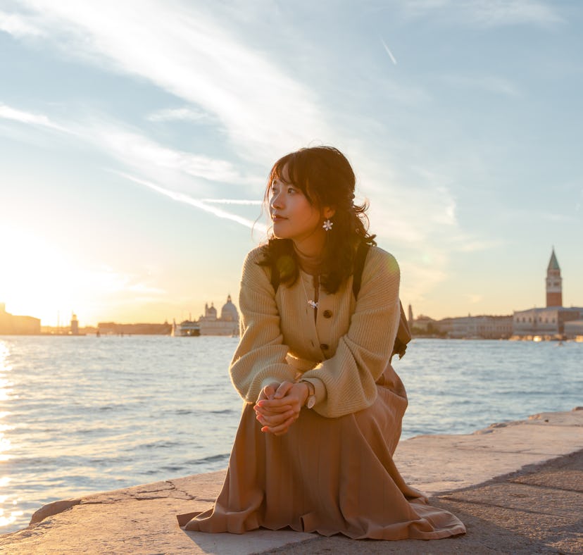 A woman in Europe takes advantage of the Black Friday 2022 travel deals that include $1,200 off a Eu...
