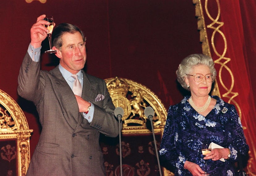 King Charles and Queen Elizabeth enjoy a drink together.