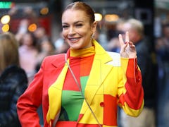 Lindsay Lohan, wearing a color block suit, is seen arriving to "Good Morning America" on November 08...
