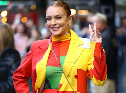 Lindsay Lohan, wearing a color block suit, is seen arriving to "Good Morning America" on November 08...