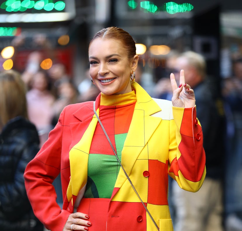 Lindsay Lohan, wearing a color block suit, is seen arriving to "Good Morning America" on November 08...