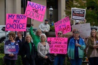 Activists protest during a "Bans Off Our Bodies" rally in support of abortion rights at Old Bucks Co...