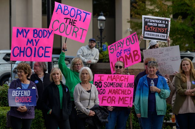 Activists protest during a "Bans Off Our Bodies" rally in support of abortion rights at Old Bucks Co...