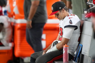 TAMPA, FL - NOVEMBER 06: Tampa Bay Buccaneers Quarterback Tom Brady (12) sits on the bench during th...