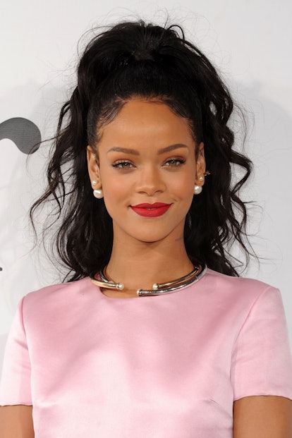 Rihanna's style evolution includes the outfit Rihanna wore to attend the Christian Dior Cruise 2015 ...