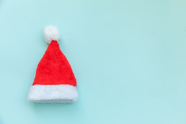 red santa hat left behind when elf on the shelf said goodbye forever