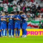 USA team huddle  during the 2022 FIFA World Cup group B match between USA and Iran on November 29, 2...