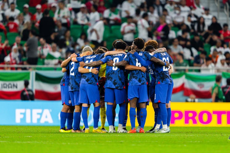 USA team huddle during the 2022 FIFA World Cup group B match between USA and Iran on November 29, 2...
