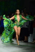 Jennifer Lopez wears one of J.Lo's most memorable red carpet looks reimagined for the Versace runway