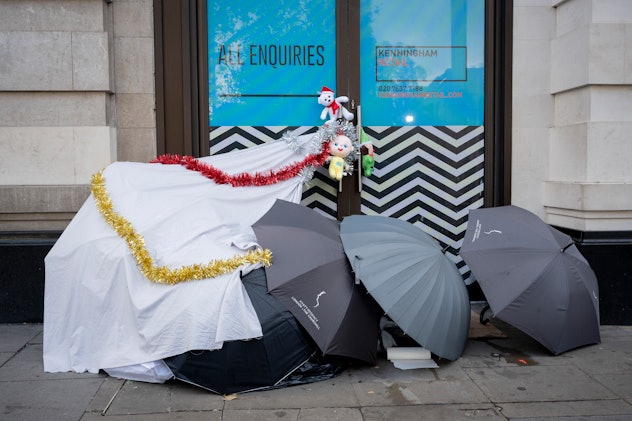 homeless living on Oxford Street in London, England - volunteer your time on Christmas Eve by helpin...
