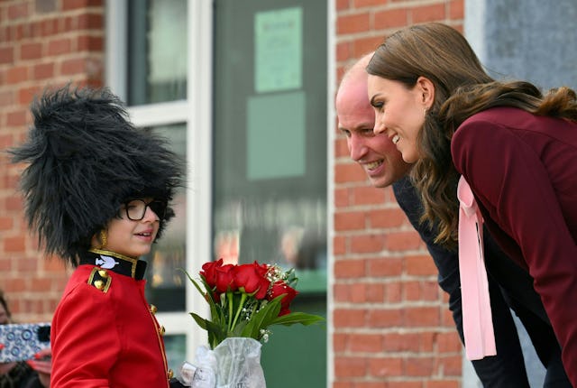 Prince William, Prince of Wales and Catherine, Princess of Wales receive flowers from Henry Dynov-Te...