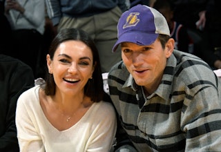 Mila Kunis and Ashton Kutcher attend a basketball between the Los Angeles Lakers and the Brooklyn Ne...