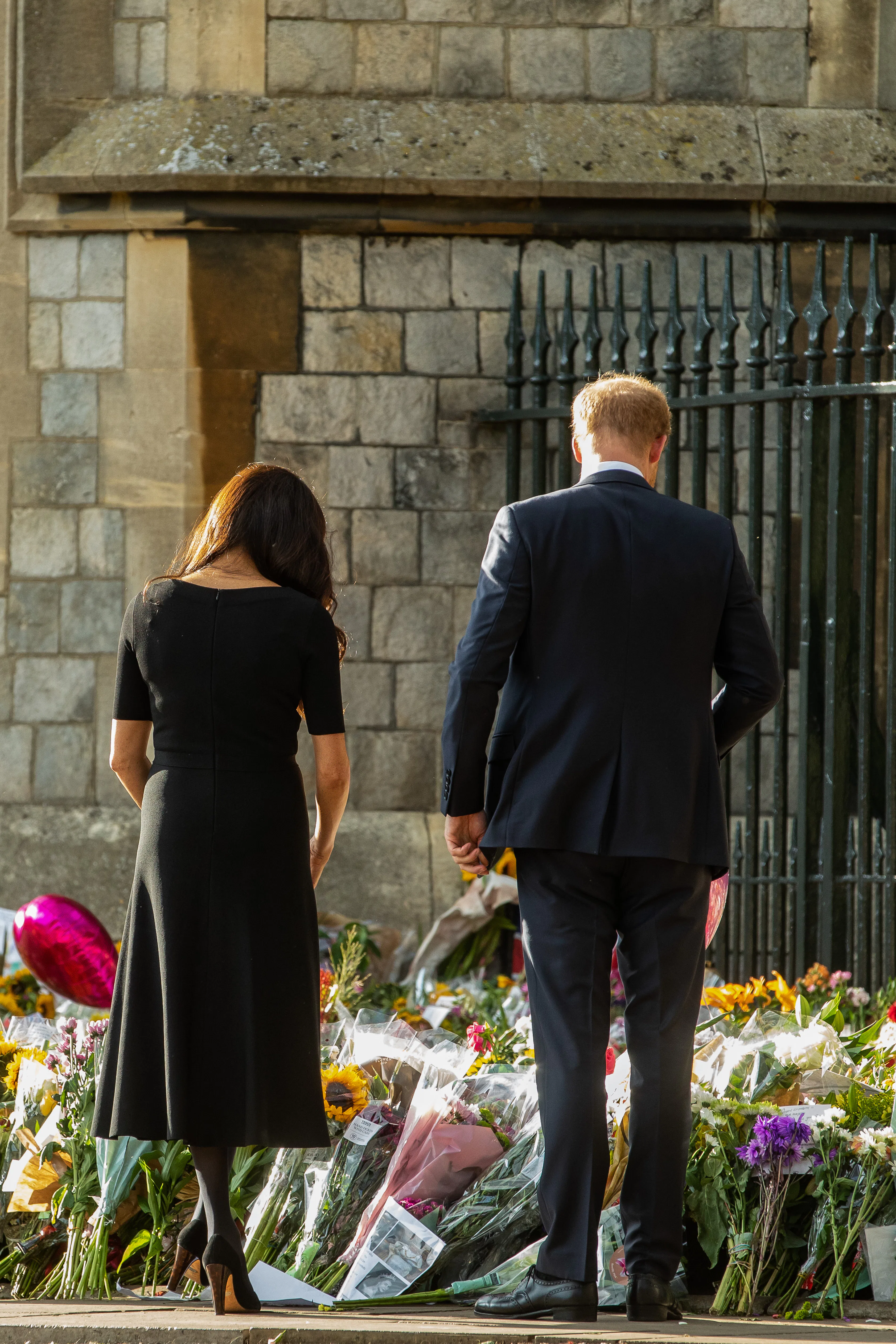 See Prince Harry & Meghan Markle's Relationship In Photos