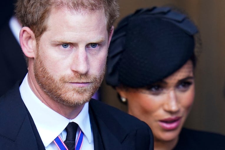 Britain's Prince Harry, Duke of Sussex and Meghan, Duchess of Sussex leave after a service for the r...