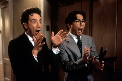 Martin Short and BD Wong reacting in shock in a scene from the film 'Father Of The Bride Part II', 1...