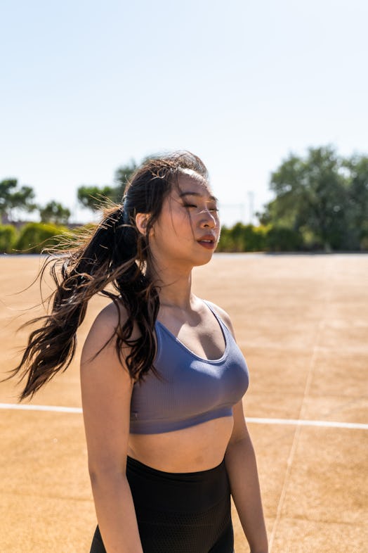 asian sportswoman posing for the camera