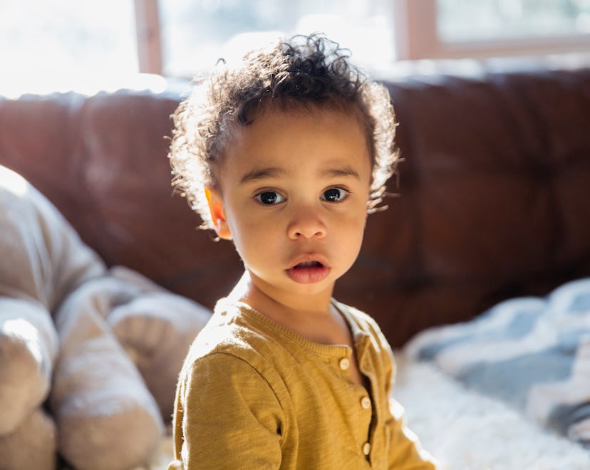 a serious baby in an article about why your baby doesn't smile a lot yet