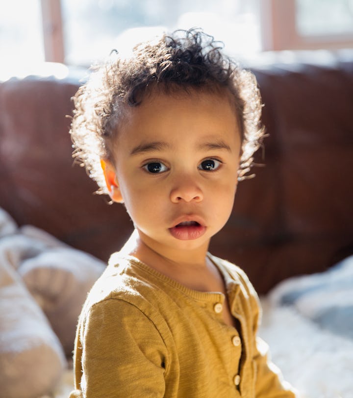 a serious baby in an article about why your baby doesn't smile a lot yet