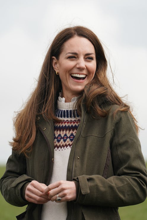 Kate Middleton wearing a beige Fair Isle knit sweater.