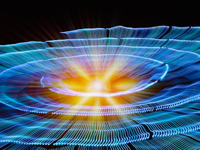 Energy glows in the center of a magnetic containment field in this illustration of fusion, energy ge...