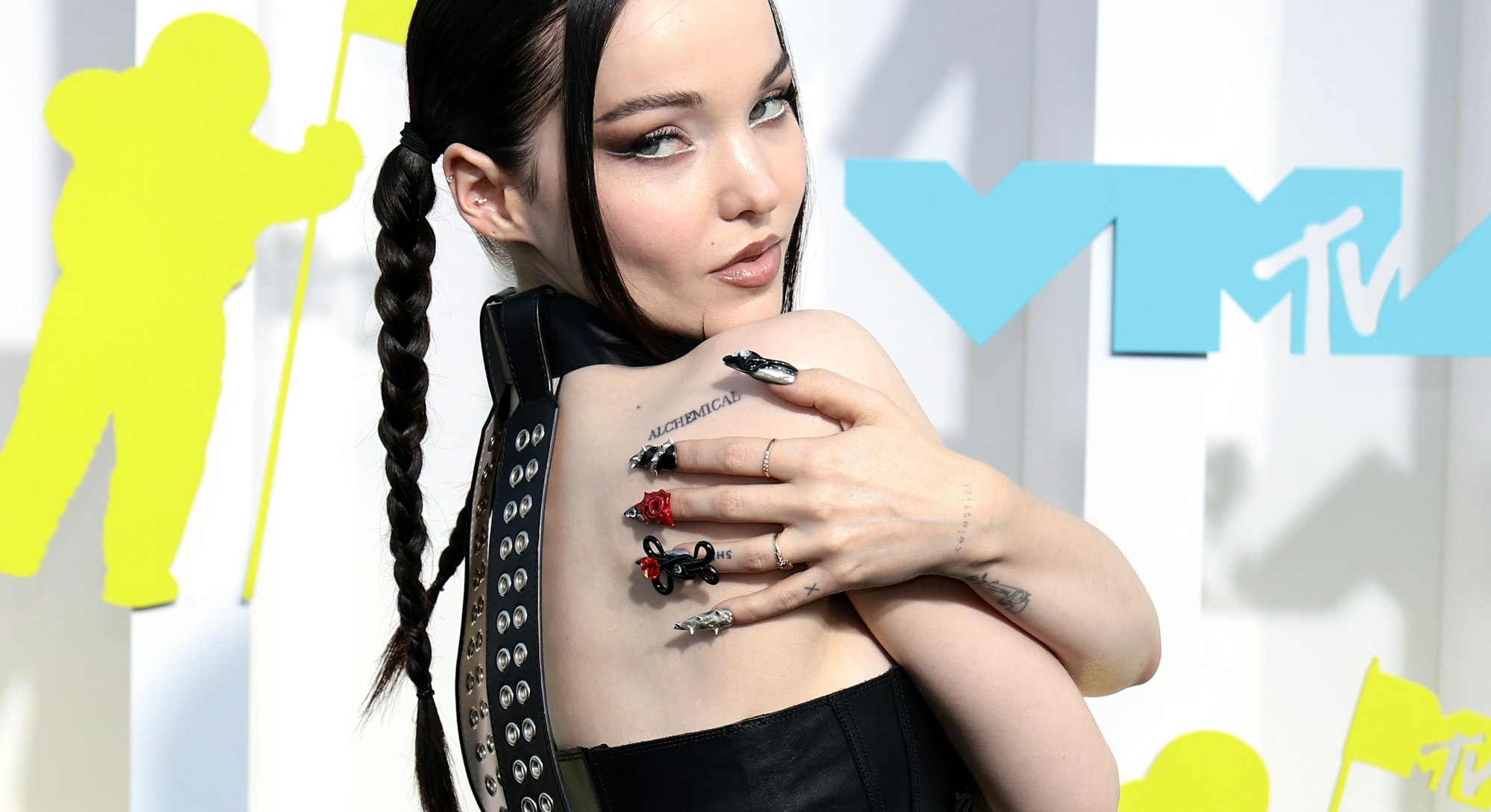 Here are the best celebrity nail art moments of 2022. Here, Dove Cameron's 3D nail art.