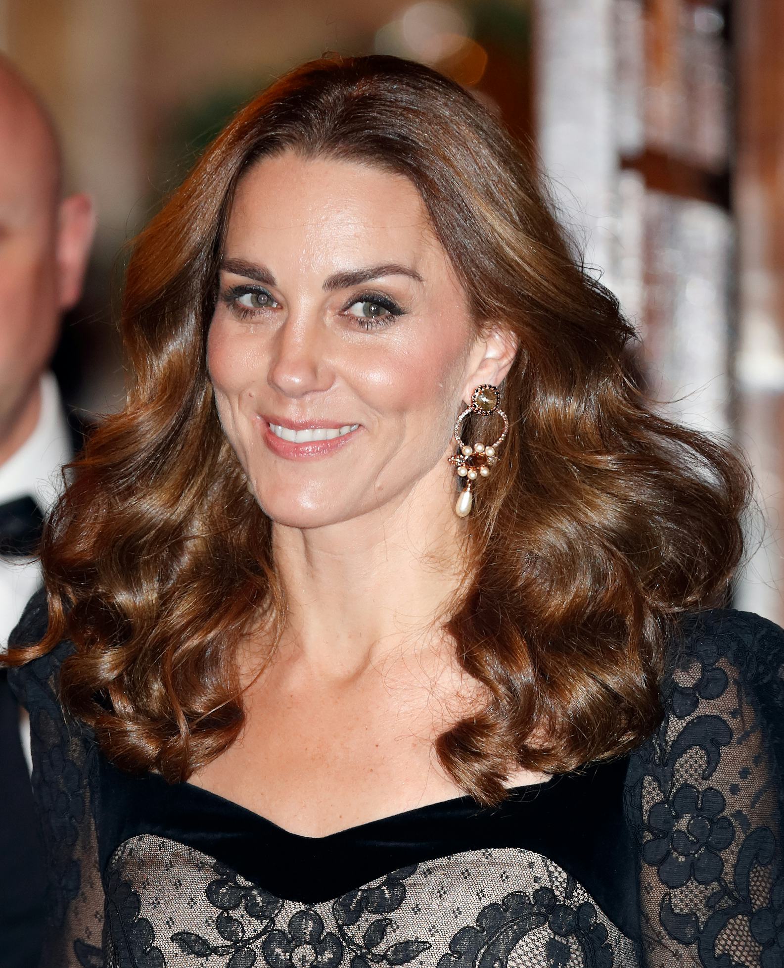 Kate Middleton tight curls and subtle winged eyeliner in 2019 