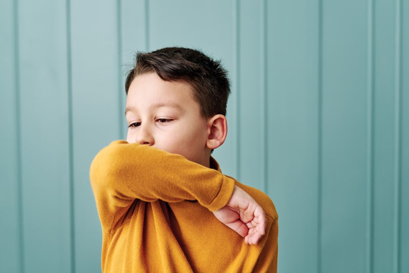 how to help child with constant cough, kid coughing into his arm