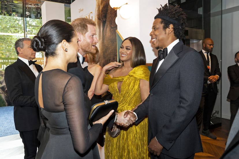 Britain's Prince Harry, Duke of Sussex (3rd L) and Britain's Meghan, Duchess of Sussex (2nd L) meet ...