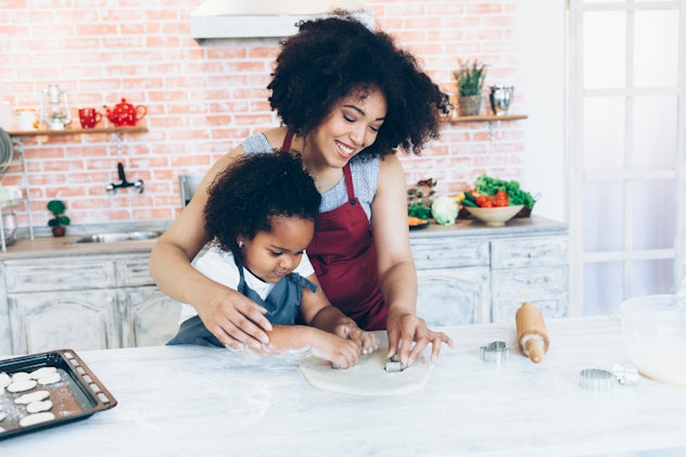 Mother and daughter baking cookies together, capricorns personality trait is that they want to act l...