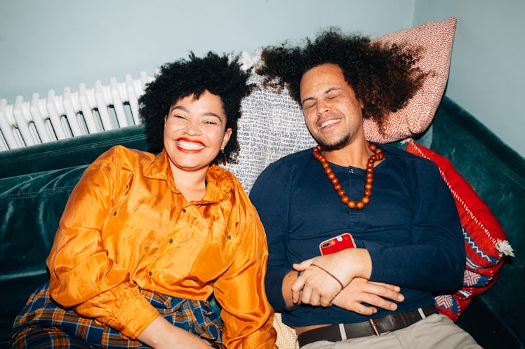 two friends pose for a photo at a house party, as they discuss how they'll be affected by the decemb...