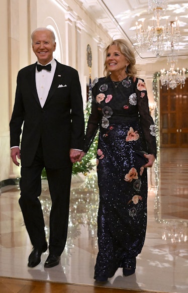 US President Joe Biden and First Lady Jill Biden arrive at a reception for the Kennedy Center Honore...