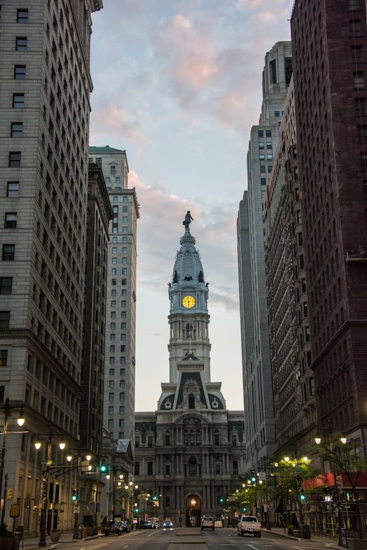 Philadelphia City Hall seen from South Broad Street at dawn in Philadelphia, Pennsylvania.