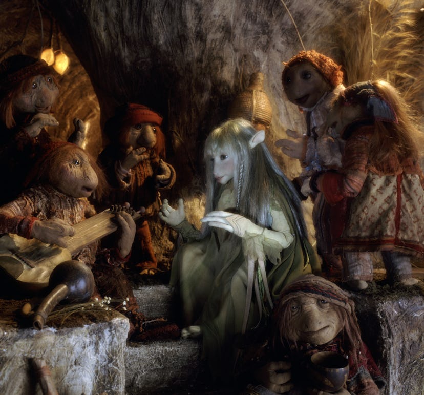 The Gelfling Kira is entertained by the Podlings, in a scene from the animatronic fantasy film 'The ...