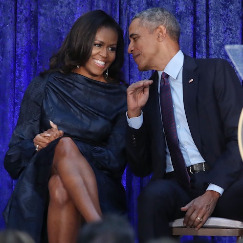 华盛顿特区- 2月12日:美国前总统巴拉克·奥巴马和第一夫人米歇尔·奥巴马分手……