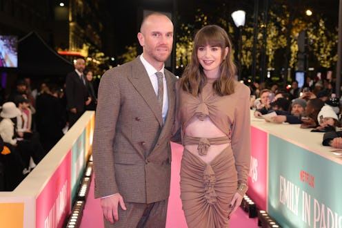 PARIS, FRANCE - DECEMBER 06:  Lily Collins and Charlie McDowell  attend the "Emily In Paris" by Netf...