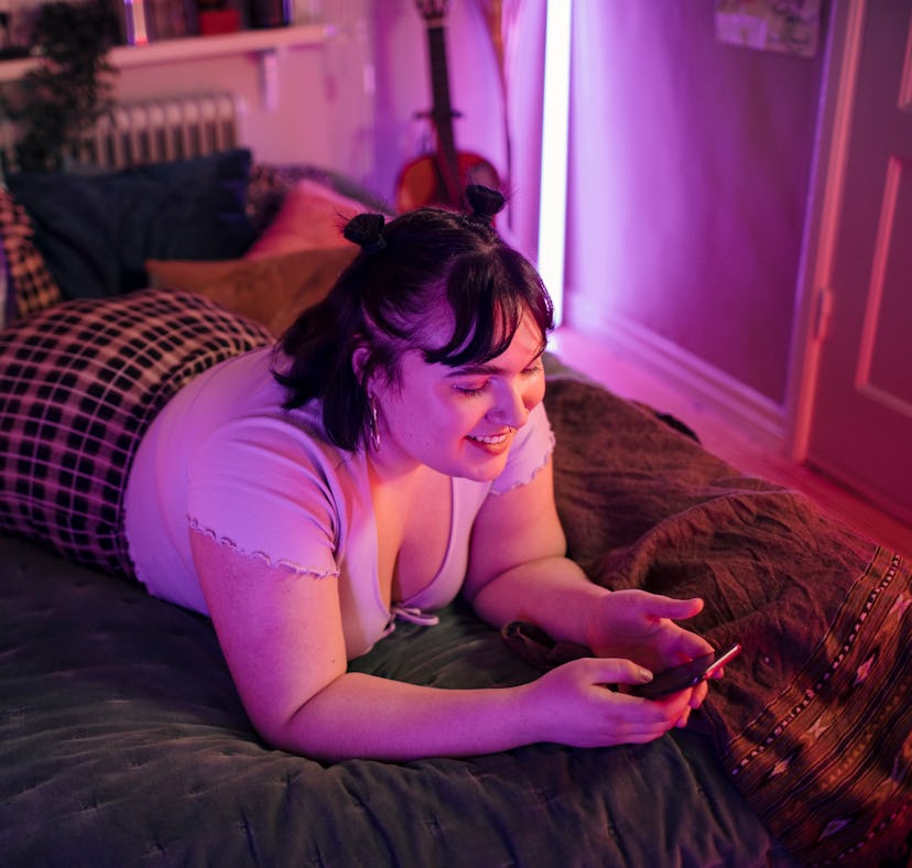 A woman creates an Instagram Recap 2022 with ideas of what to post in an Instagram Recap.