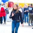 Jennifer Aniston wearing black crop jacket