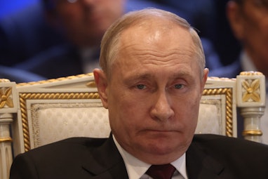 YEREVAN, ARMENIA - NOVEMBER 23: (RUSSIA OUT) Russian President Vladimir Putin grimases during the SC...