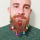 Man with Christmas decorations in beard