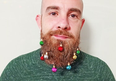 Man with Christmas decorations in beard