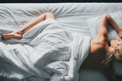 woman in bed with vulvar itching that's worse at night