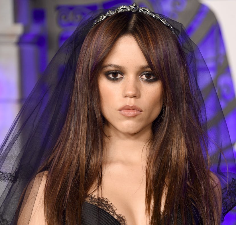 Jenna Ortega, whose zodiac sign is the same as Wednesday Addams, poses for a photo during a red carp...