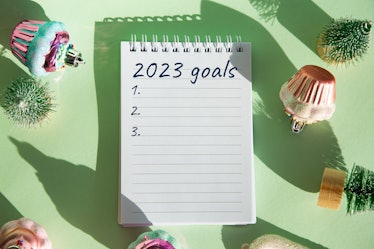 Notebook with new year's goals for 2023, which include templates from TikTok.