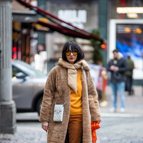 COPENHAGEN, DENMARK - FEBRUARY 01: Susan Stjernberger is seen wearing silver Chanel bag, moon boots,...