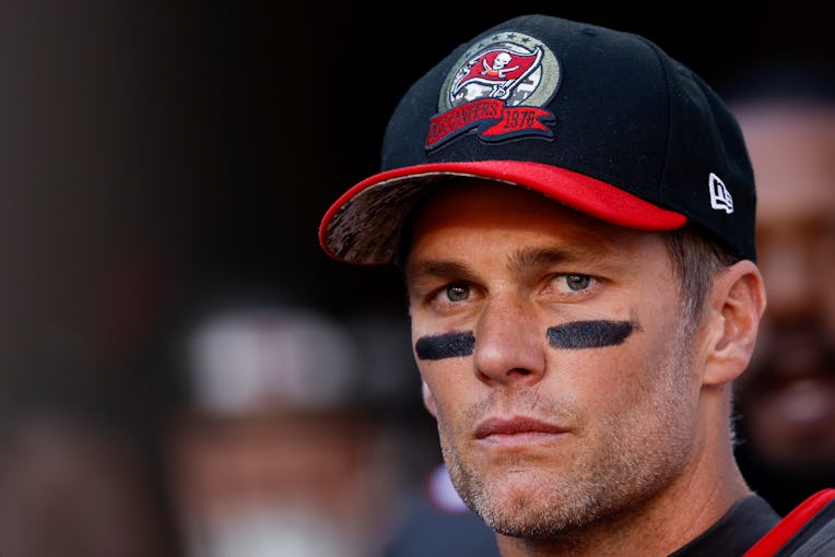 TAMPA, FLORIDA - DECEMBER 18: Tom Brady #12 of the Tampa Bay Buccaneers looks on prior to the game a...