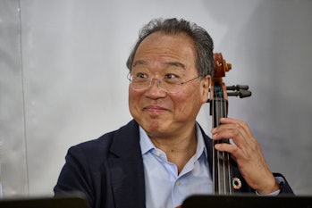 LISBON, PORTUGAL - MARCH 29: US cellist Yo-Yo Ma plays with fellow musicians the Allegro of Mozart's...