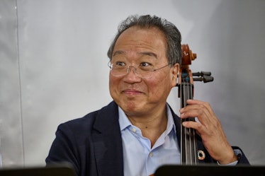LISBON, PORTUGAL - MARCH 29: US cellist Yo-Yo Ma plays with fellow musicians the Allegro of Mozart's...