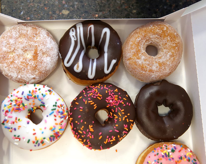 Is Dunkin' open on New Year's? Yes, and you can grab a box of a variety of donuts like this one.