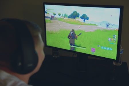 Aidan Fry plays Fortnite in his room after school Monday. Photo by Lauren A. Little  4/30/2018  (Pho...