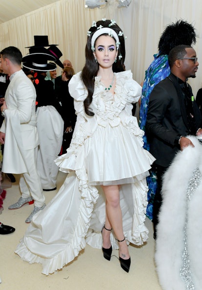 Lily Collins attends The 2019 Met Gala Celebrating Camp: Notes on Fashion at Metropolitan Museum of ...